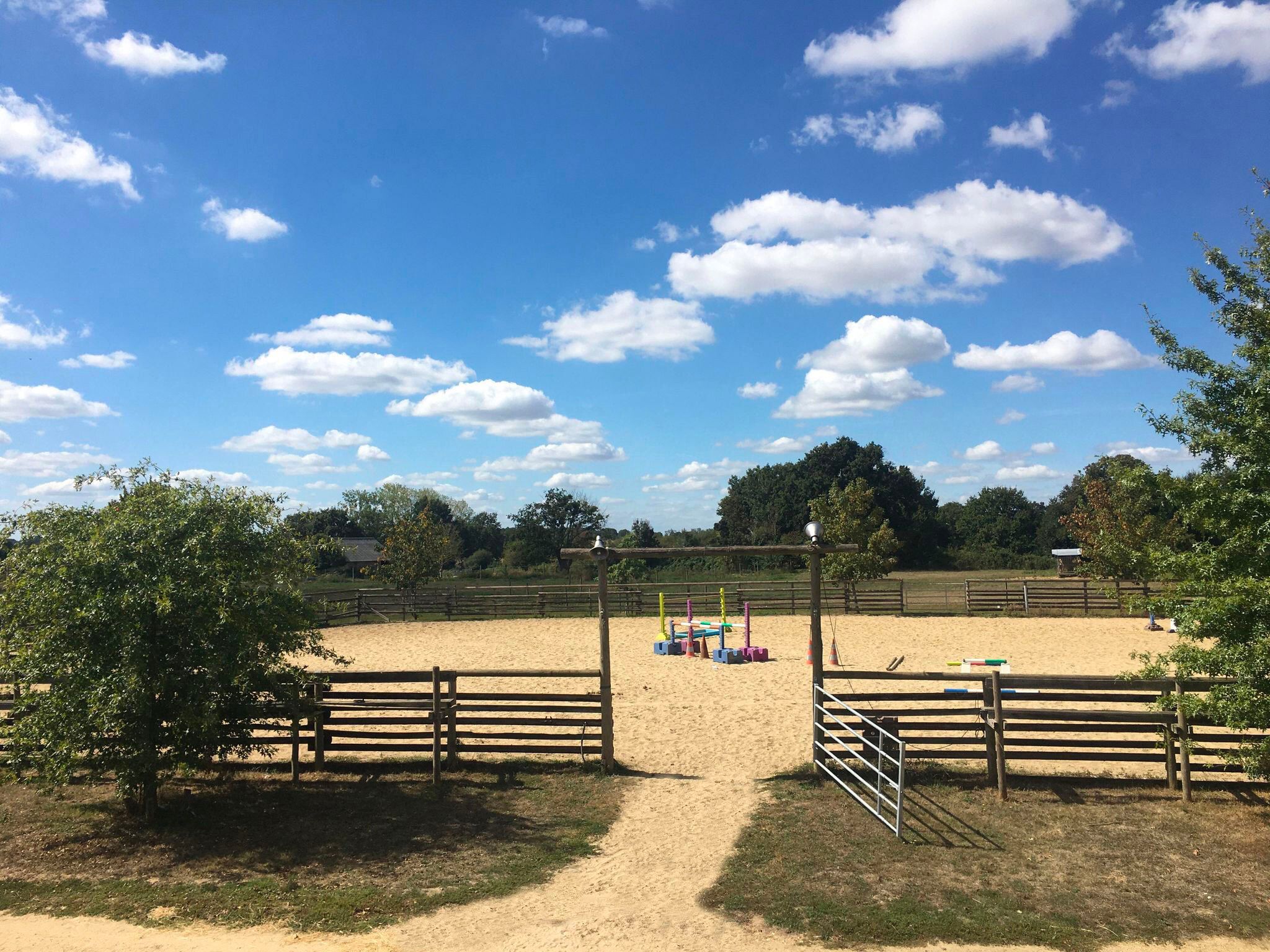 Sand outdoor arena with wooden fencing