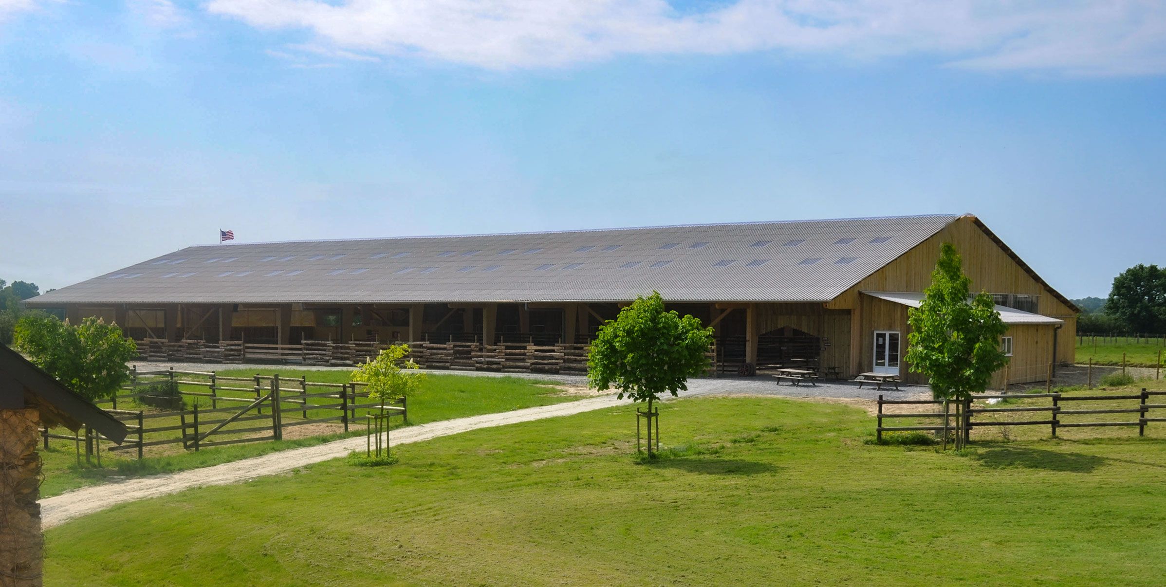 The indoor arena building, seen from the lawn